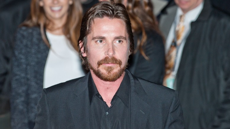Actor Christian Bale leaving the press conference for the movie "American Hustle"